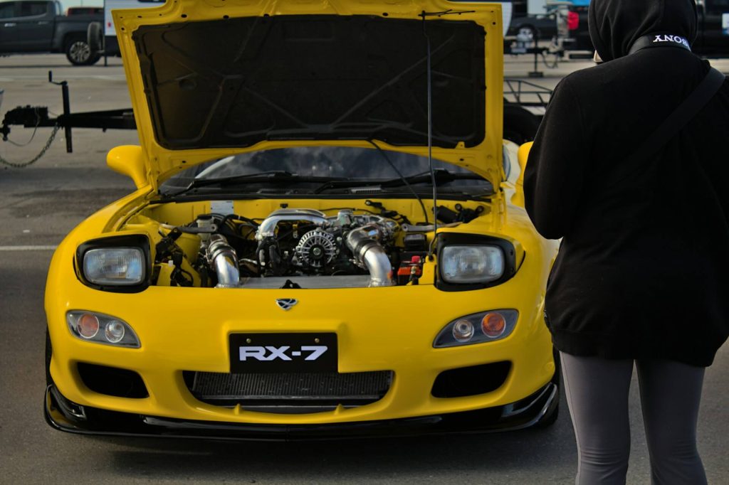 yellow mazda rx7 engine view